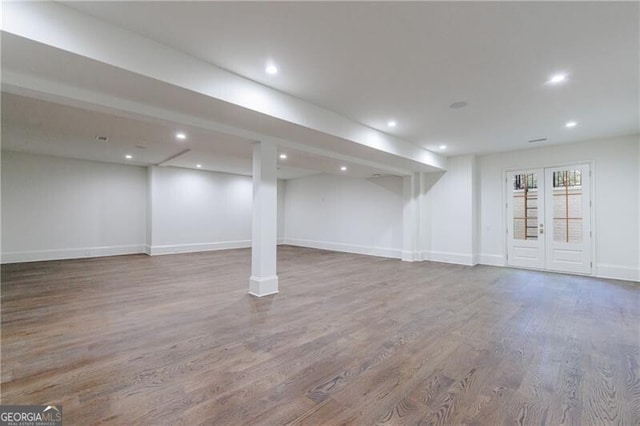 basement with wood-type flooring