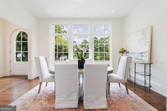 dining area with wood-type flooring