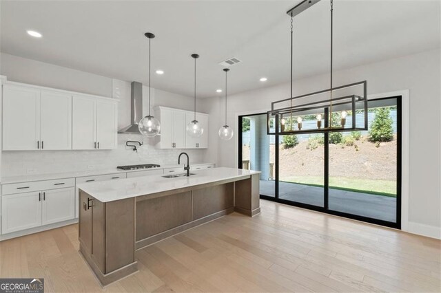 unfurnished living room with plenty of natural light, a fireplace, dark hardwood / wood-style flooring, and built in features