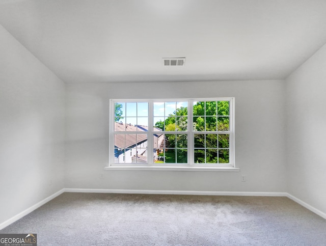 empty room featuring carpet floors