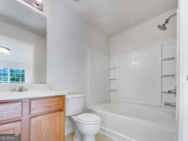 full bathroom featuring toilet, tile flooring, a textured ceiling, vanity, and  shower combination