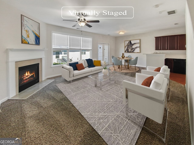 living room featuring ceiling fan