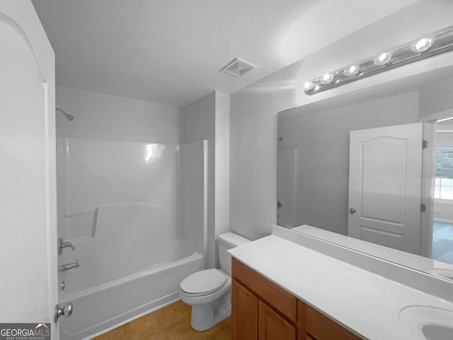 full bathroom with double sink vanity, tub / shower combination, toilet, and tile flooring