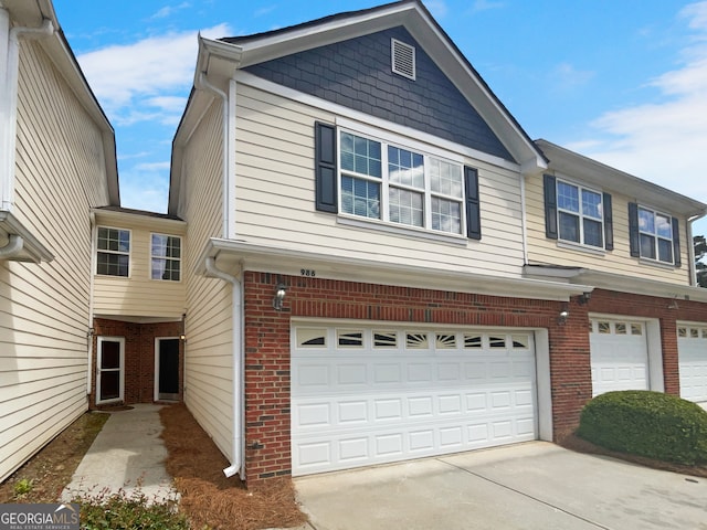 view of front of property featuring a garage