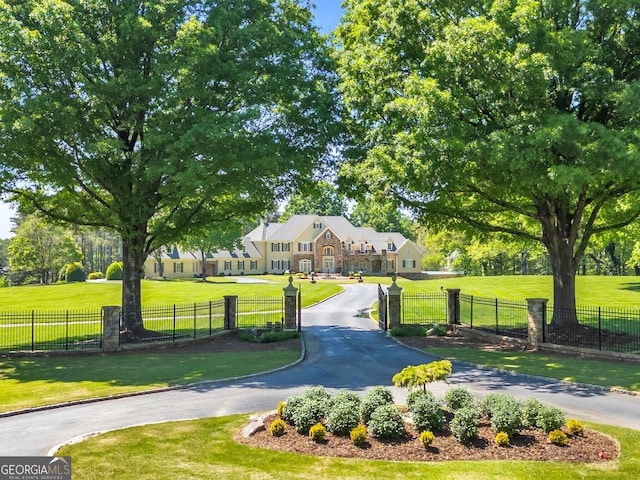 surrounding community featuring a lawn