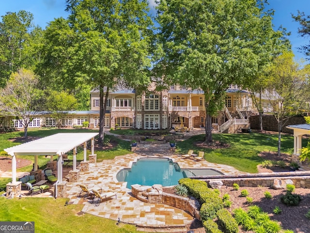 view of pool featuring a patio area