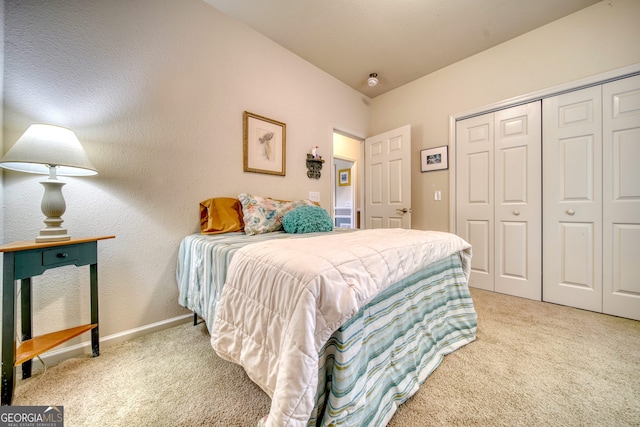 carpeted bedroom with a closet