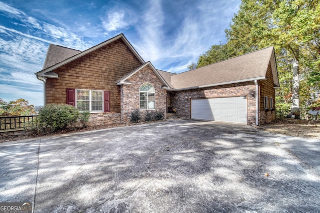 front of property with a garage