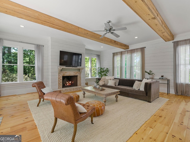 dining space with light wood-type flooring, ornamental molding, and sink