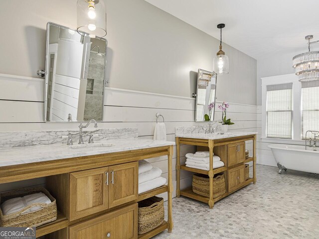 bathroom featuring tile patterned flooring and vanity