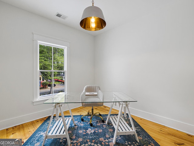 unfurnished bedroom featuring ceiling fan and wood-type flooring