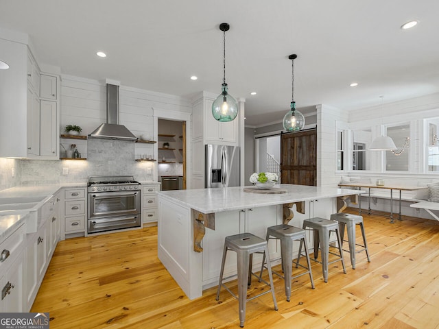 interior space with crown molding, french doors, ceiling fan, and hardwood / wood-style flooring