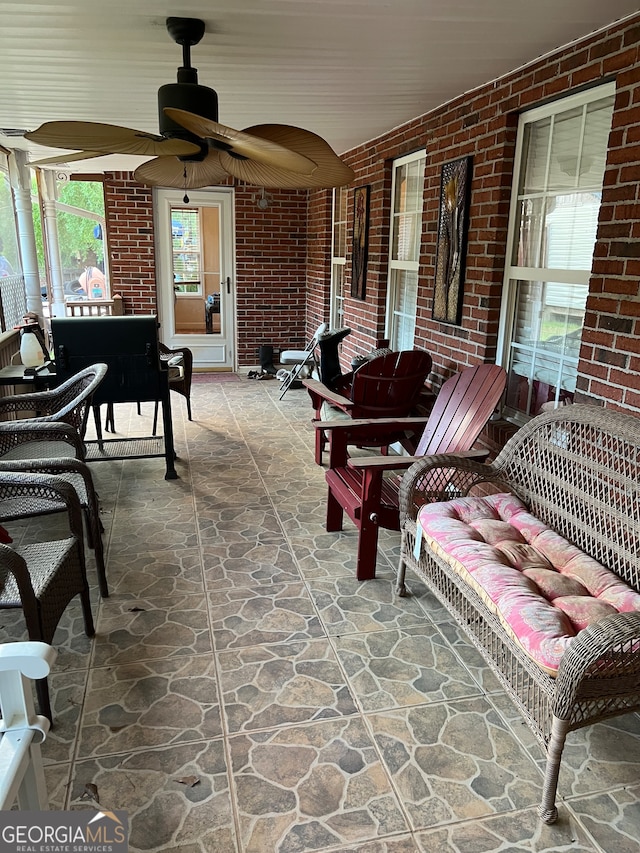 view of patio / terrace with an outdoor hangout area and ceiling fan