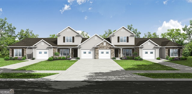 view of front of house featuring a garage and a front yard