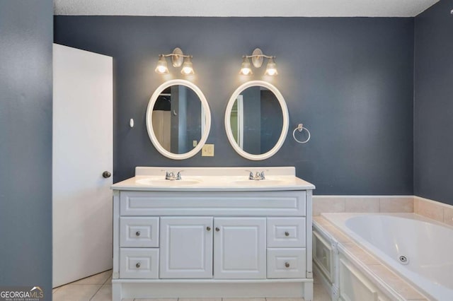 bathroom with tile flooring, a bath, dual vanity, and a textured ceiling