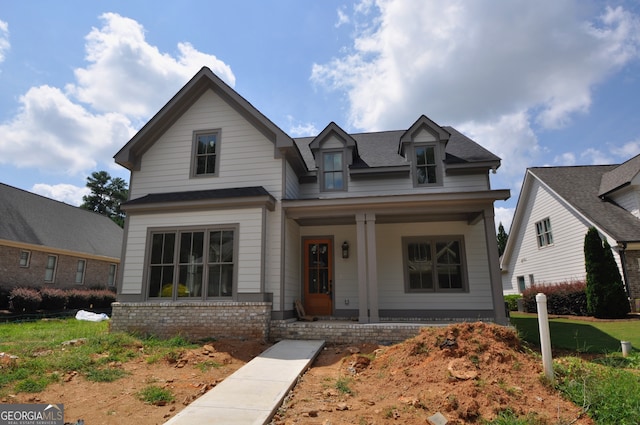 view of front of home featuring covered porch