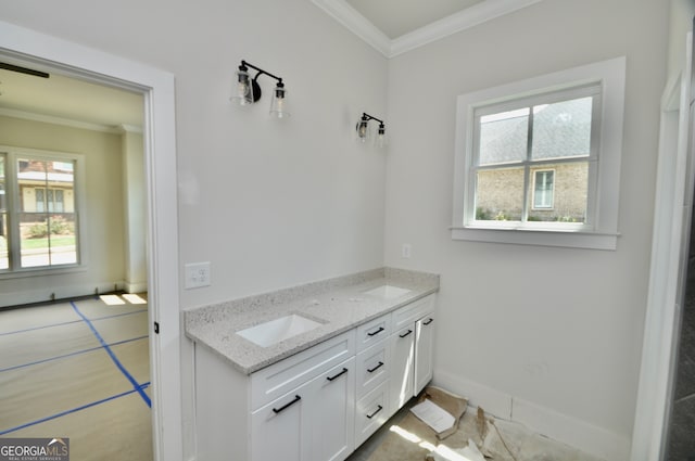 bathroom featuring crown molding, vanity, tile patterned flooring, and a wealth of natural light