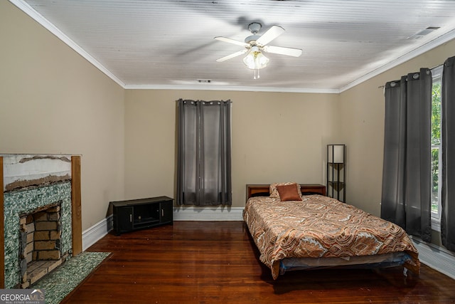 bedroom featuring ceiling fan, ornamental molding, and dark wood-type flooring