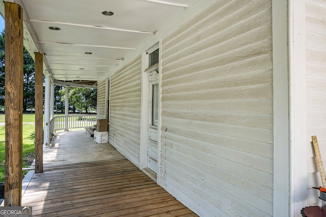 wooden deck featuring covered porch