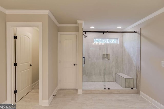 bathroom featuring crown molding and walk in shower