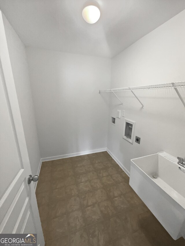 washroom with washer hookup and electric dryer hookup