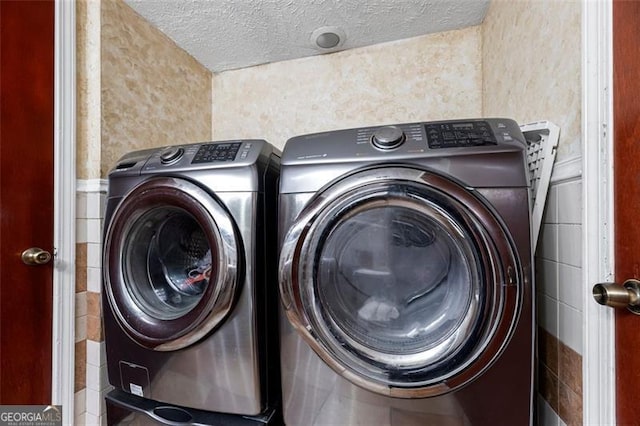 washroom featuring separate washer and dryer