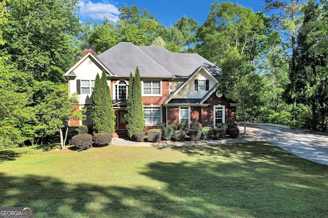 view of front of house with a front lawn