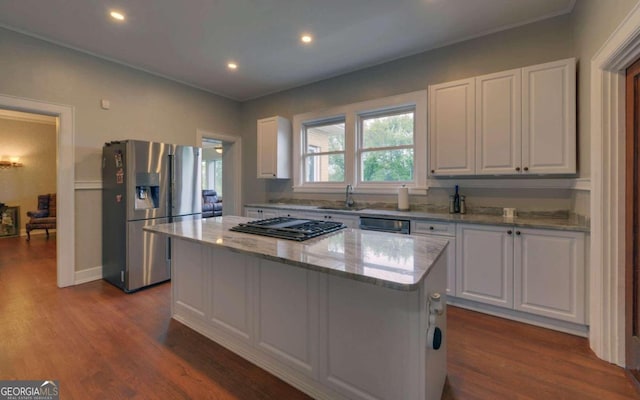 kitchen with a center island, white cabinets, hardwood / wood-style floors, and stainless steel refrigerator with ice dispenser