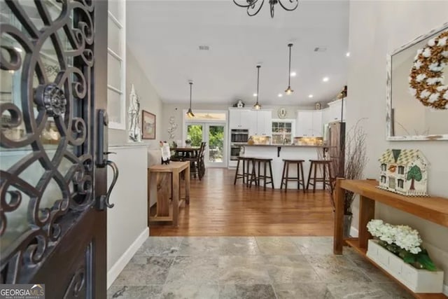 foyer entrance featuring tile floors