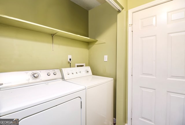 laundry area featuring washer and clothes dryer