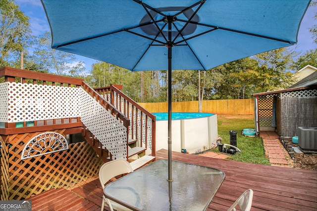 wooden deck featuring central AC