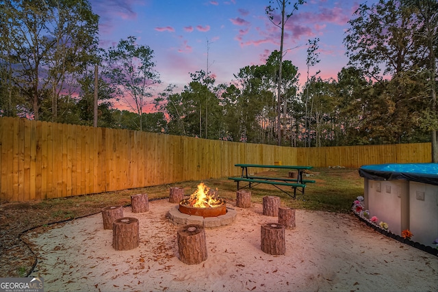 exterior space with a fire pit