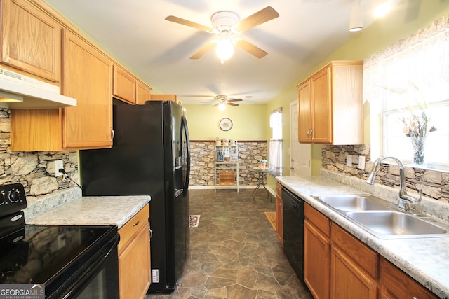 kitchen featuring black appliances, sink, tasteful backsplash, dark tile flooring, and ceiling fan