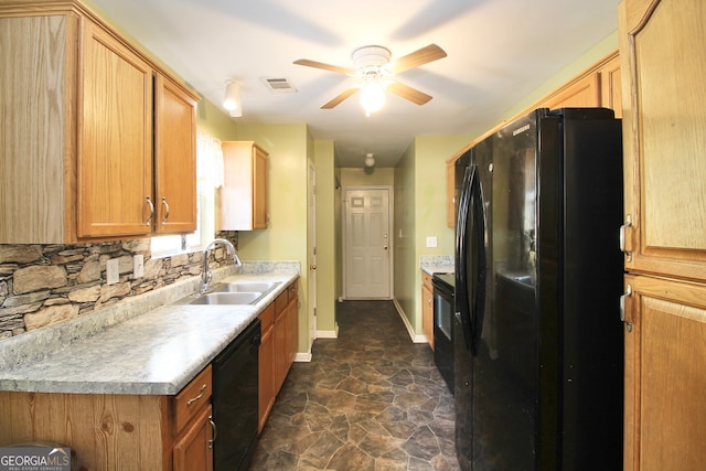 kitchen with ceiling fan, sink, dark tile flooring, tasteful backsplash, and black appliances