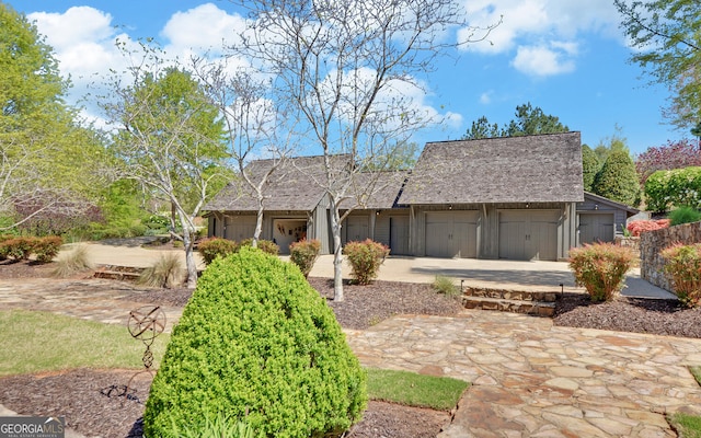 ranch-style home with a garage