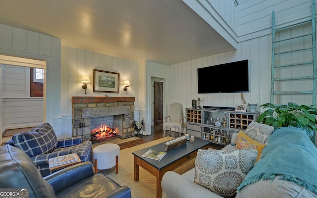 living room featuring a fireplace and hardwood / wood-style flooring