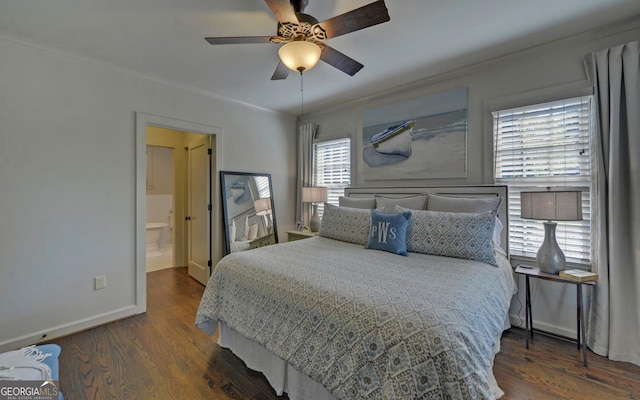 bedroom with ceiling fan, dark hardwood / wood-style flooring, ornamental molding, and ensuite bath