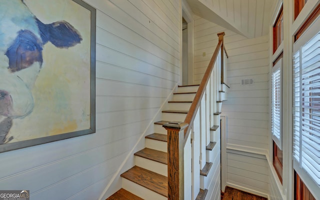 staircase featuring hardwood / wood-style flooring