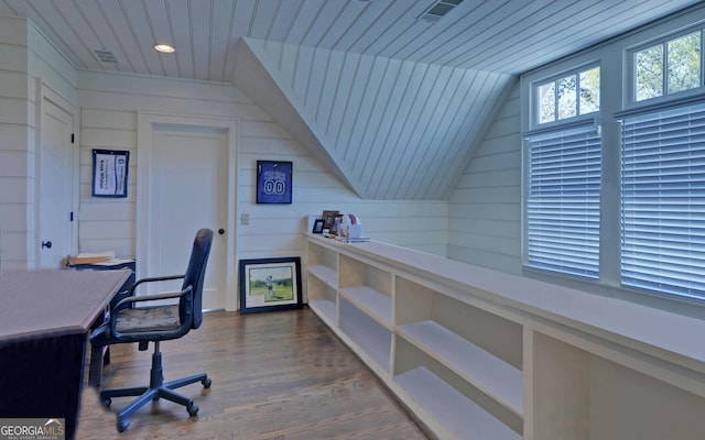 office with lofted ceiling, wood walls, and dark hardwood / wood-style flooring