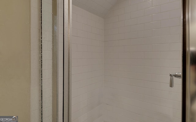 details with a tile shower