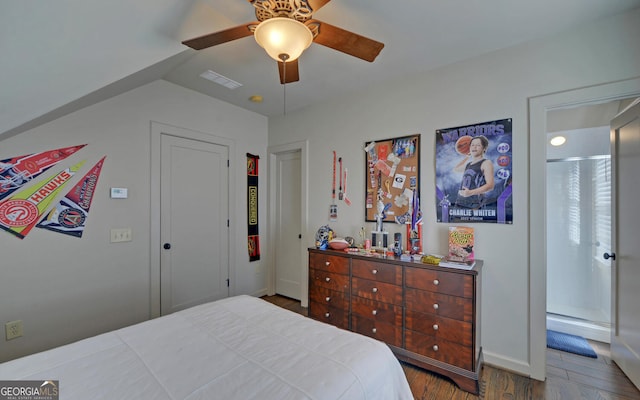 bedroom with ceiling fan and hardwood / wood-style floors