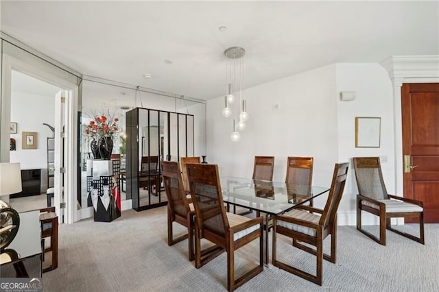 view of carpeted dining area