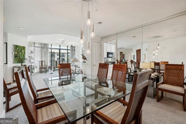 view of carpeted dining room