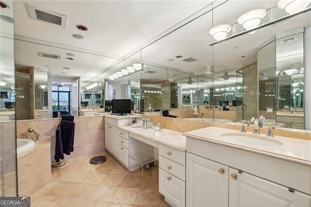 bathroom featuring tile floors and vanity