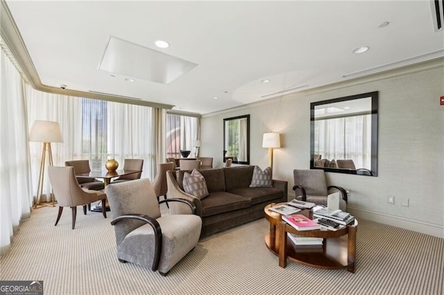 carpeted living room with crown molding