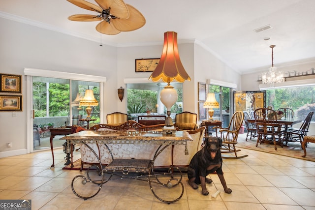 tiled dining room with ornamental molding, high vaulted ceiling, and a notable chandelier