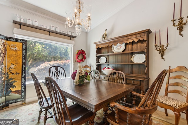 dining room with ornamental molding, a notable chandelier, lofted ceiling, and light tile floors