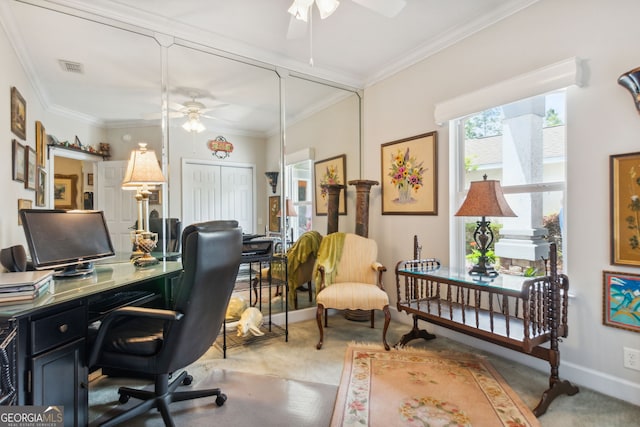 carpeted office with ceiling fan and ornamental molding