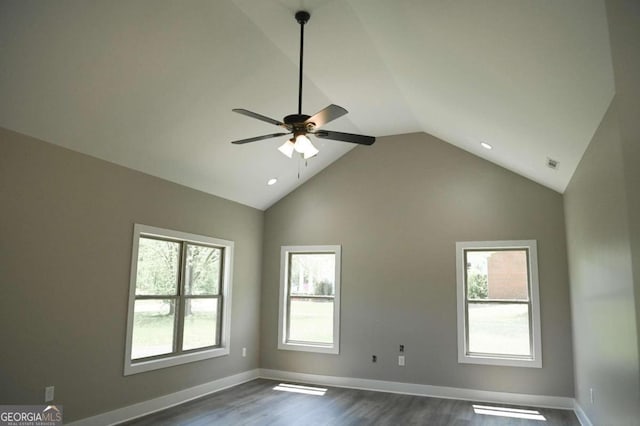 unfurnished room featuring high vaulted ceiling, ceiling fan, and dark hardwood / wood-style floors