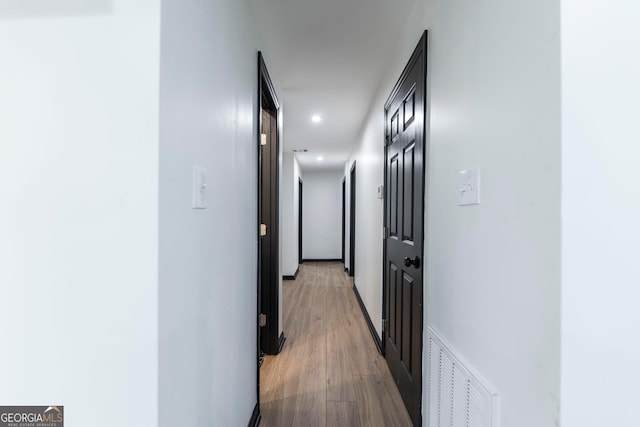 hall featuring hardwood / wood-style flooring